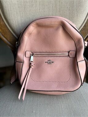 coach backpack purse pink Court With Ruching Signature coated canvas with smooth leather details Inside zip pocket Zip closure fabric lining Top handle with 2 drop Outside zip pocket Adjustable shoulder straps 10 3/4 (L) x 12 1/2 (H) x 4 (W) Style No. Coach Bags | Coach Court